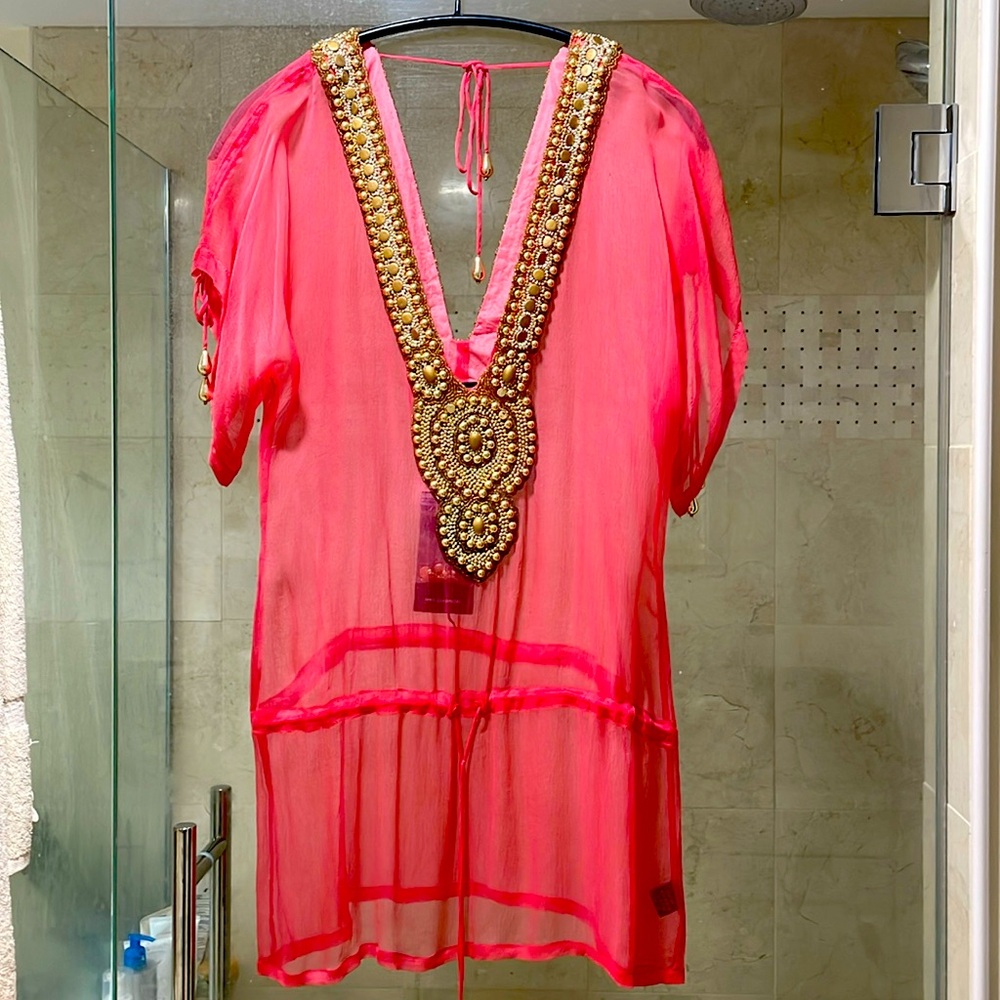 Coral/pink, gold embellishments, sheer swim cover up.